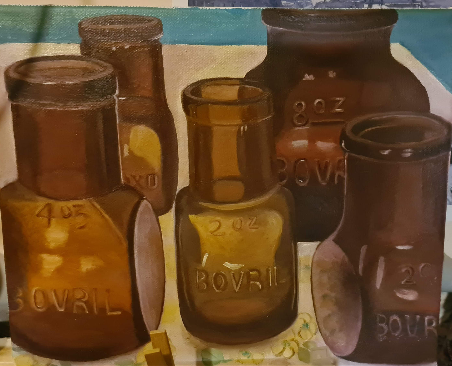 Collection of vintage glass bottles with labels on a table